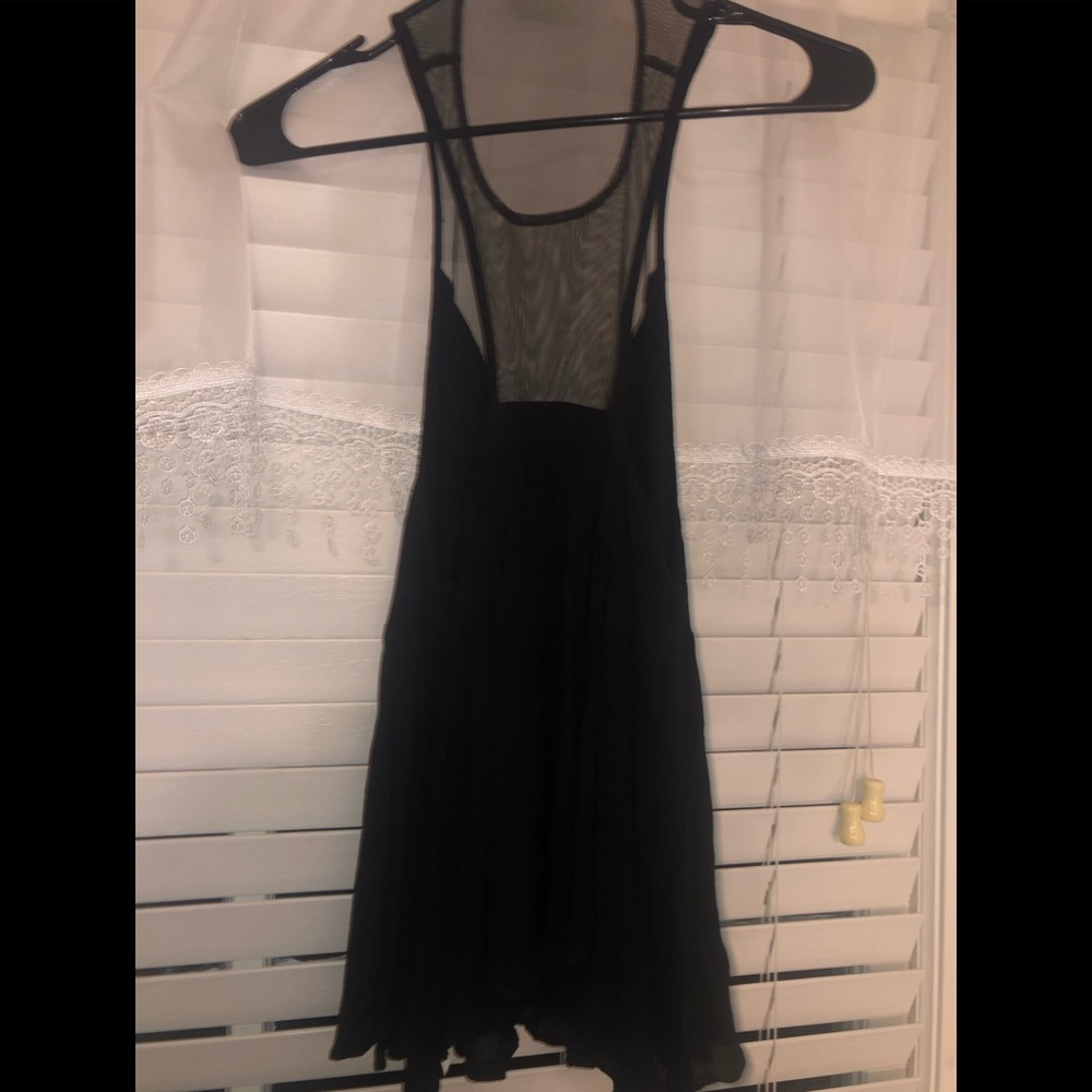Free people black mesh flowy top